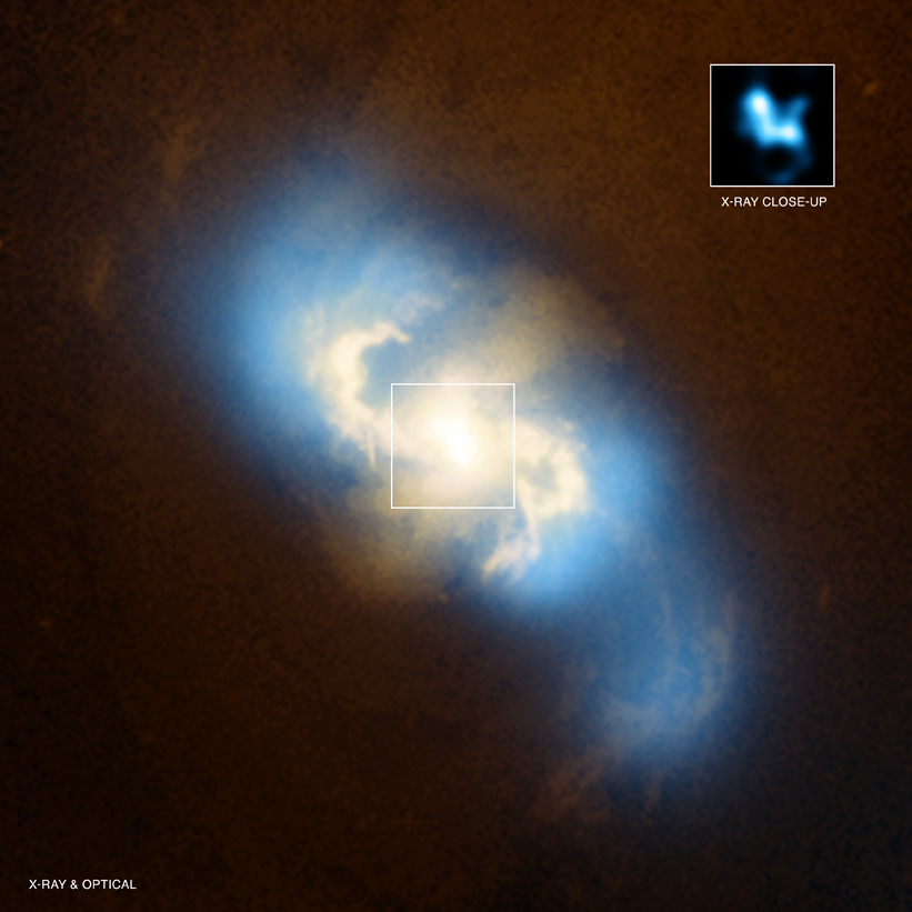 Space Cannibal: Ginormous Black Hole Caught Eating Another